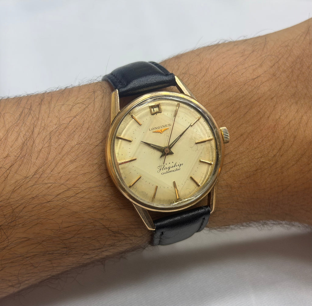 Vintage Longines Flagship Automatic Cream Dial - Date at 12 o'clock with Gold Caravelle Ship Medallion