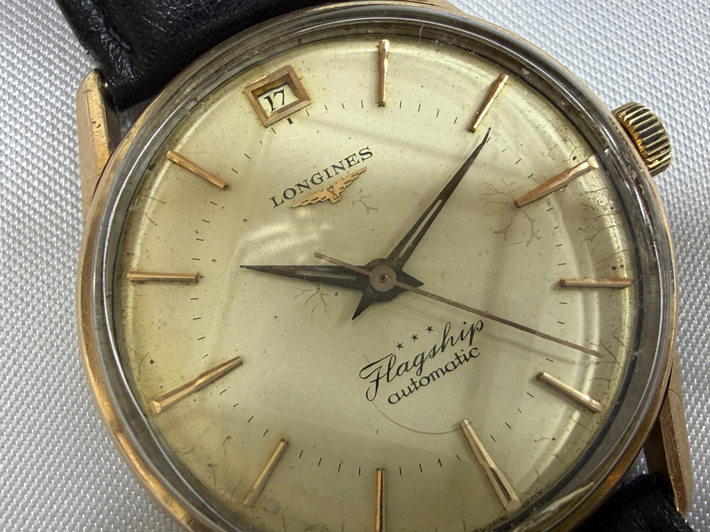 Vintage Longines Flagship Automatic Cream Dial - Date at 12 o'clock with Gold Caravelle Ship Medallion